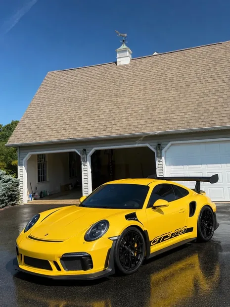 Yellow Porsche 911 GT3 RS after an exterior detail
